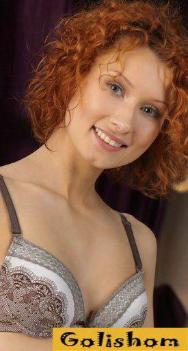 Red-haired beauty in erotic underwear