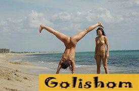 Gymnast girls on the seashore