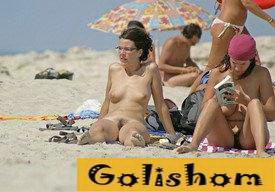 Bold nudists on the beach-photos