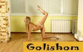 Naked gymnastics at home on the floor