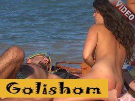 Naked nudist with her boyfriend sunbathing without panties-video