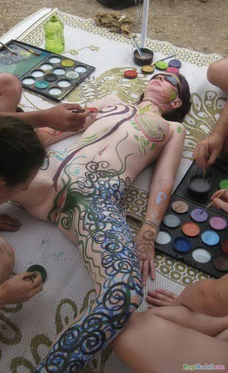 Beautiful bodies of girls are painted with paints