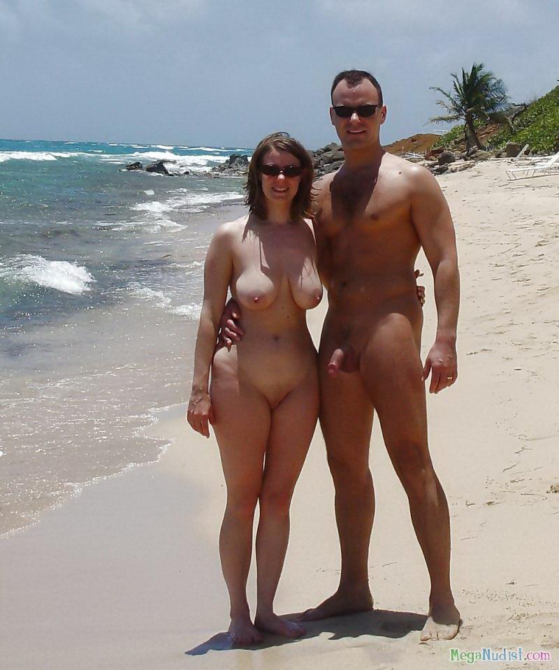 Nudist couples on the beach