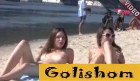 Nudist girls relax on the beach in Kiev