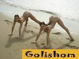 Naked gymnastics on the beach