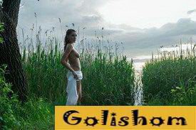 Nudist Galya on the bank of the Volga River