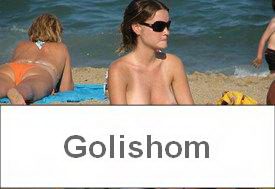 Elastic tits of nudists on the beach