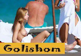 Ashlyn Alexandra lit up topless on the beach