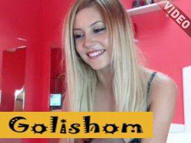 A very beautiful girl communicates on a webcam and dances a striptease-video