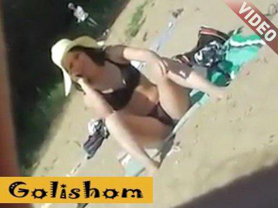 Flashing on the beach in transparent panties-video