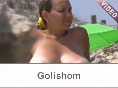 Huge tits on the beach in Spain-video