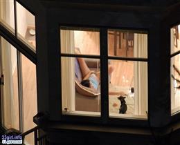 Hidden camera through the window-a girl masturbates at home